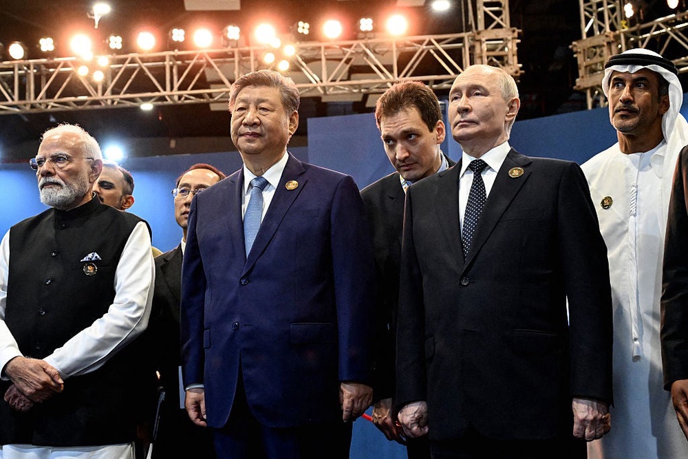 China's President Xi Jinping (front center) and Russia's President Vladimir Putin (front right) during the 18th BRICS Summit in New Delhi on September 12, 2026 (POOL/AFP via Getty Images)