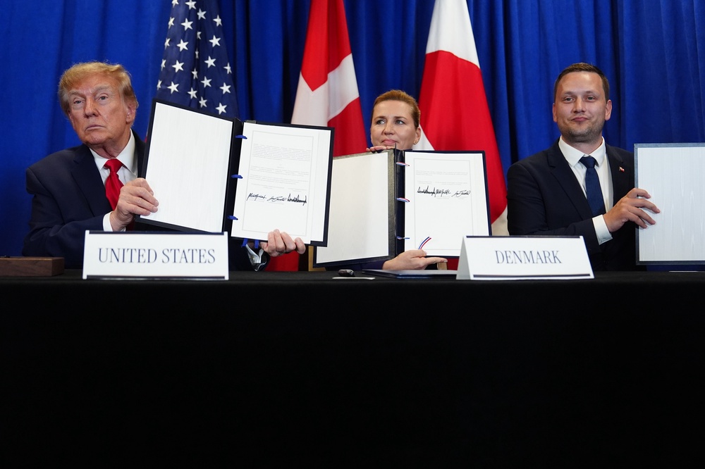 Donald Trump with Denmark’s PM Mette Frederiksen and Greenland’s premier Jens-Frederik Nielsen (Julia Demaree Nikhinson/AP) (AP)