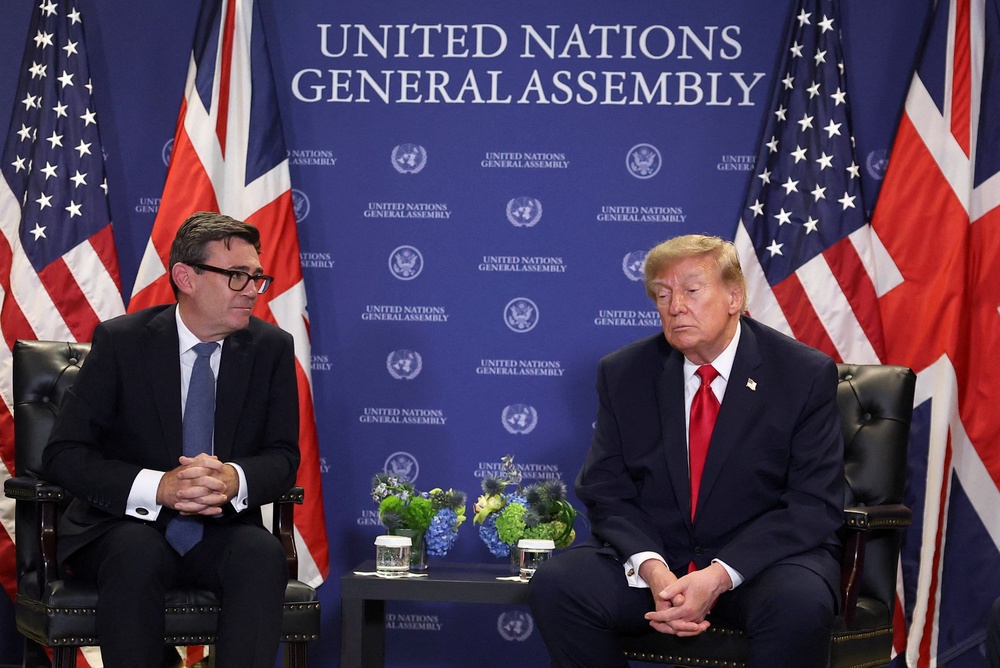 'I think that a settlement is going to be reached,' Trump said while seated alongside Burnham (Getty)