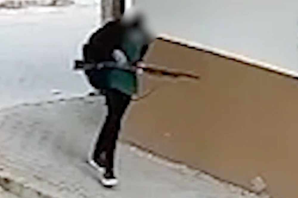 The man is seen in another video fiddling with the weapon’s moving parts (Turkish media)