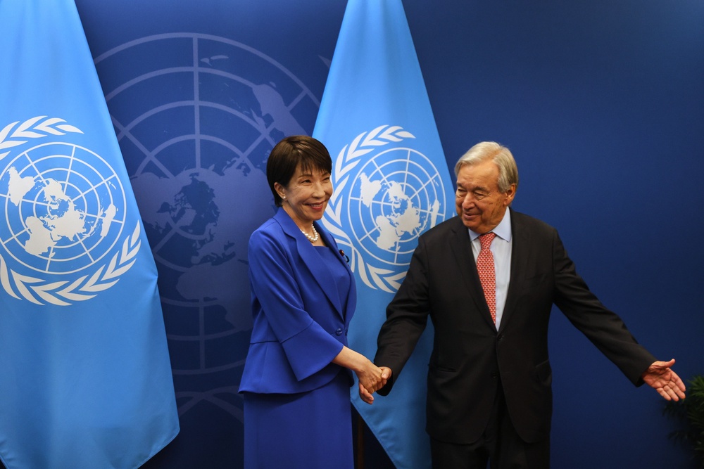 Japan's Prime Minister Sanae Takaichi, left, shakes hands with United Nations Secretary-General Antonio Guterres at United Nations (AP)