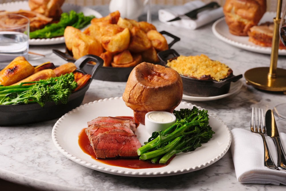 Abé keeps the bones of the Sunday roast intact – crisp potatoes, Yorkshire pudding and proper gravy – but makes a case for ketchup with her roasted tomato version (Sally Abe/Light Speed)