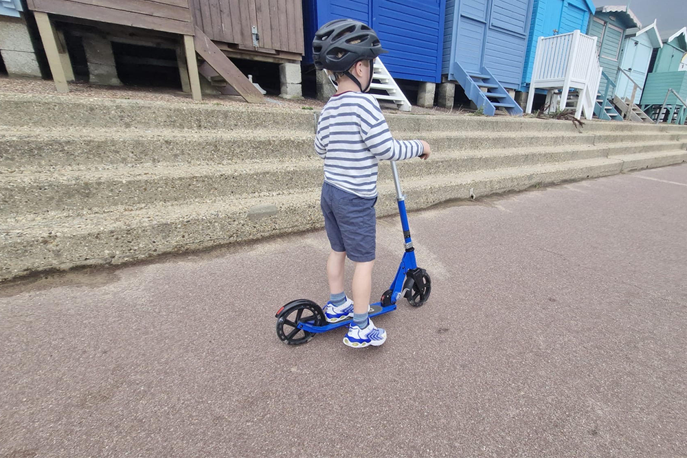 It feels notably less rickety than lighter, smaller scooters (Kayleigh Rattle/The Independent)