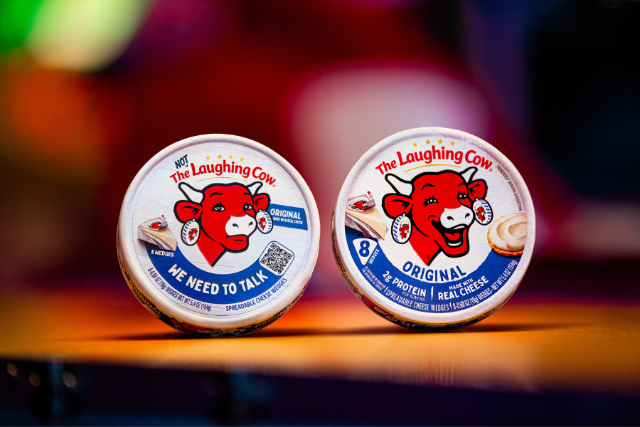 Select Laughing Cow cheese packages nationwide now feature the usually smiling mascot with a serious expression and a mysterious message: 'We need to talk' (The Laughing Cow)