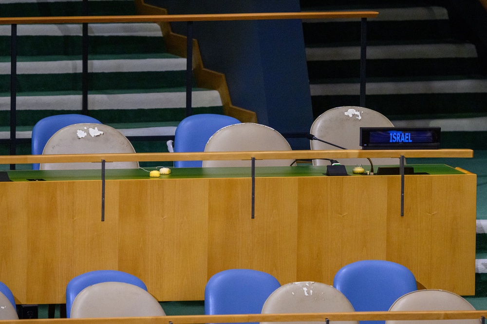 Seats for the Israel delegation remain empty during the speech by Iran’s President Pezeshkian (Getty)