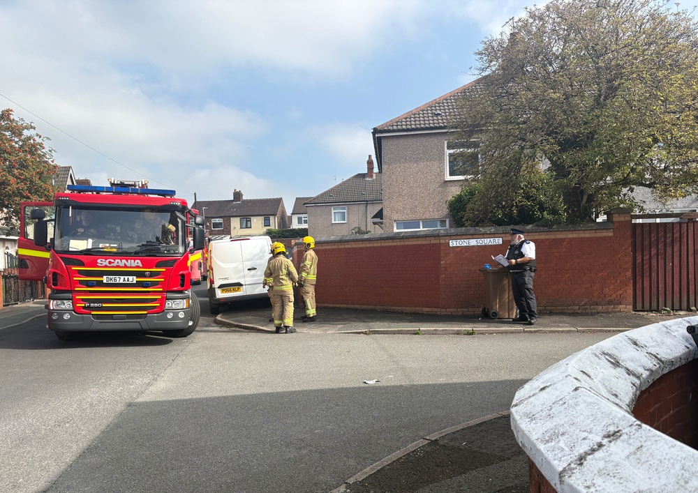 Emergency personnel at a fire in Stone Square in Bootle (PA) (PA Wire)
