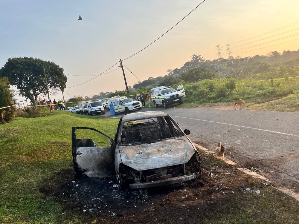 A burnt-out vehicle was found at the scene of the incident and is believed to have belonged to one of the victims, according to local reports (South African Police Service)