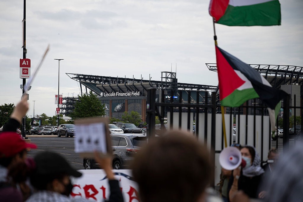 Protesters gather outside of Ed Sheeran's Philadelphia concert on Saturday (19 September) (Getty Images)