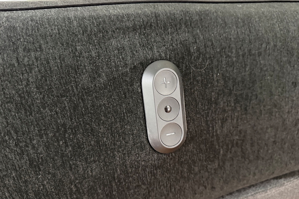 A long press on the top or bottom button tells the Pod to warm you up or cool you down by one increment (David Phelan/The Independent)