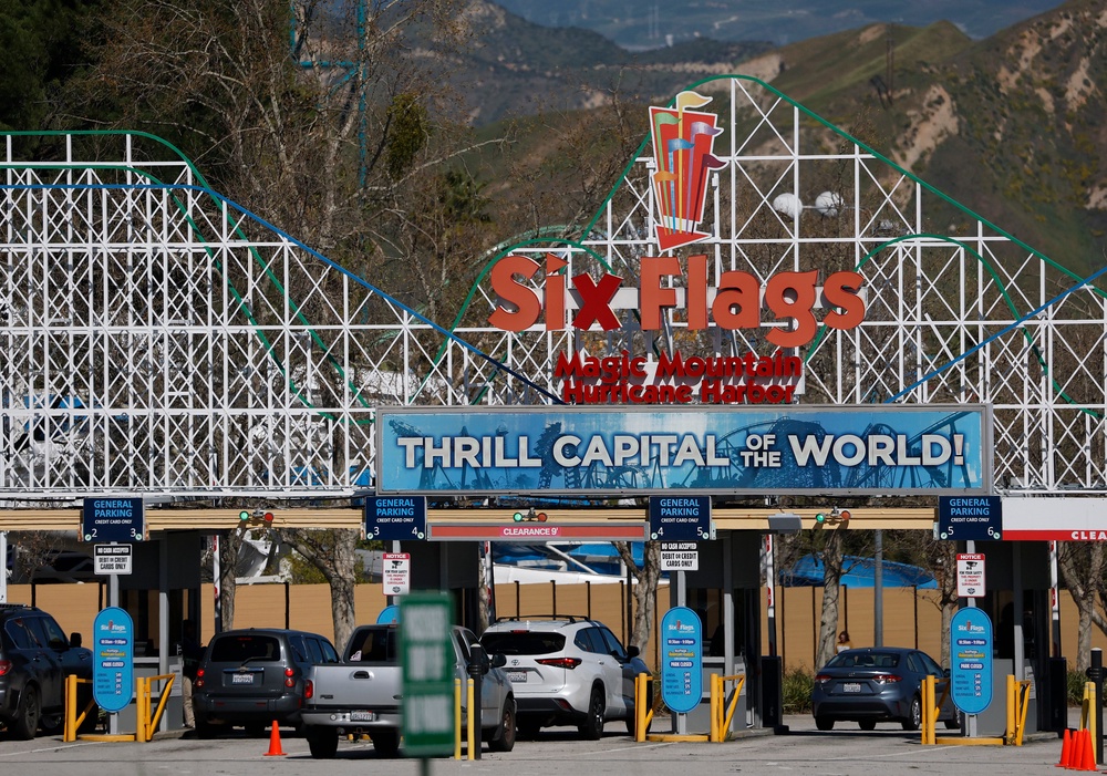 An investment firm that teamed up with NFL star Travis Kelce to save Six Flags Entertainment Corporation is now urging the embattled theme park operator to explore a sale, according to a new report (Getty Images)