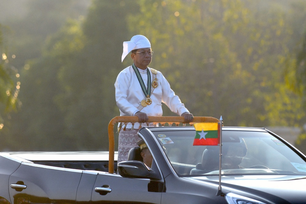 Min Aung Hlaing oversees a military display to mark Myanmar’s Independence Day in Naypyidaw (AFP/Getty)