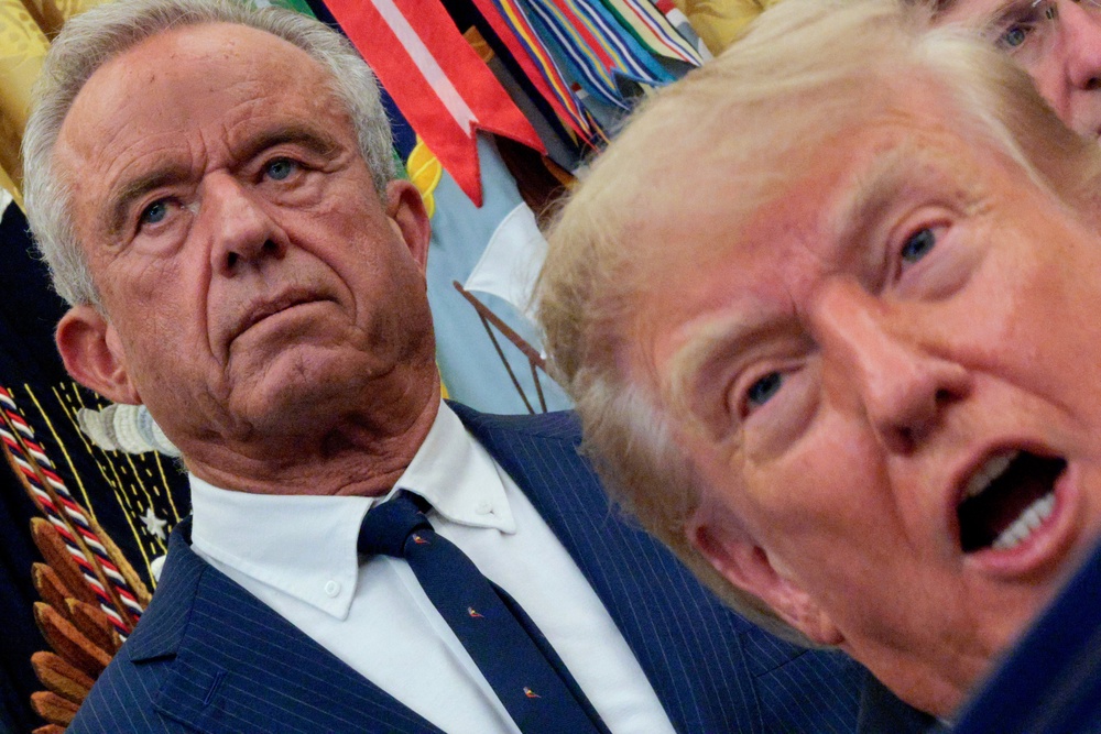 Overton stood beside Trump and Health Secretary Robert F. Kennedy in the Oval Office last month when they falsely suggested that the use of combination vaccines could be a contributor to autism (Getty)