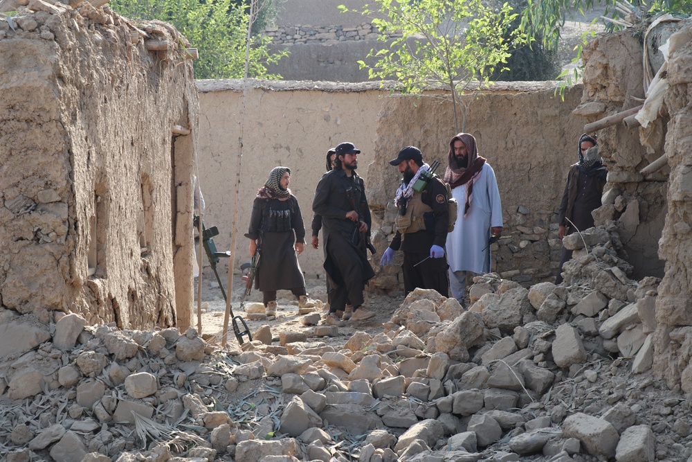 Taliban security personnel inspect the site, after Pakistani airstrike struck Gurbuz district in Afghanistan's Khost province on 24 September 2026 (AFP/Getty)