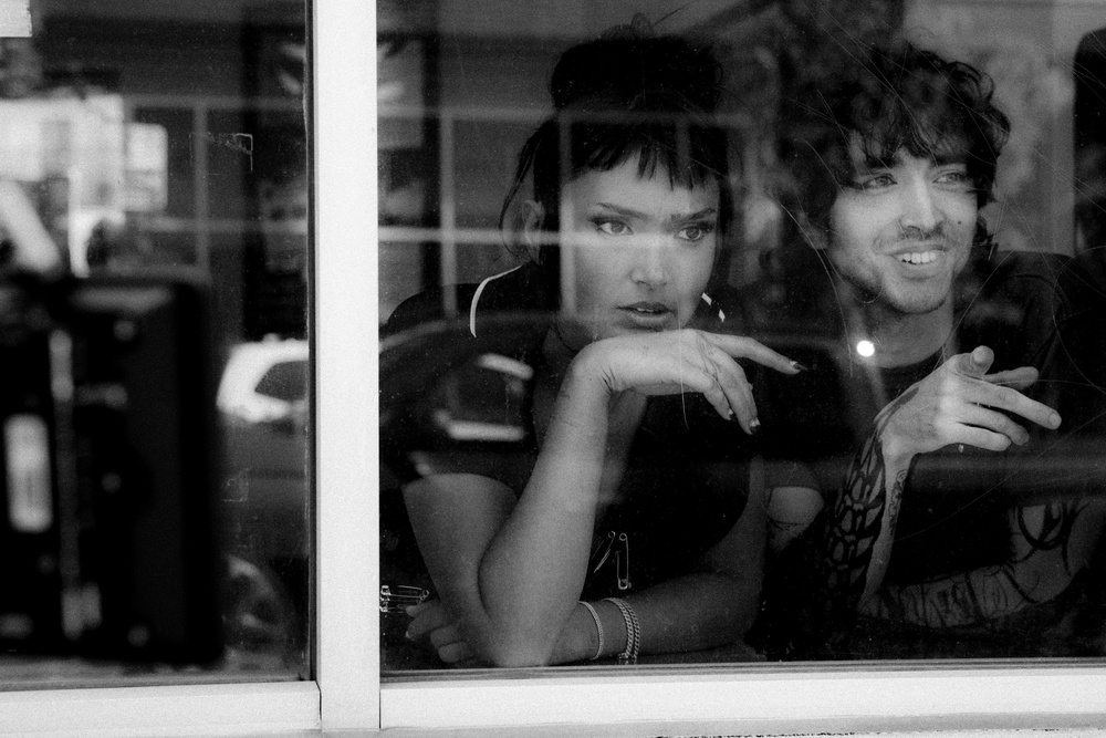 Crookes with co-star Matt Whipps in the music video for ‘Painkiller’ (Press)