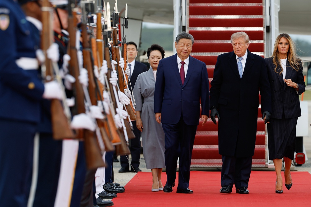 A red-carpet arrival ceremony for Xi Jinping on Wednesday came complete with a military flyover and an artillery salute (Getty Images)