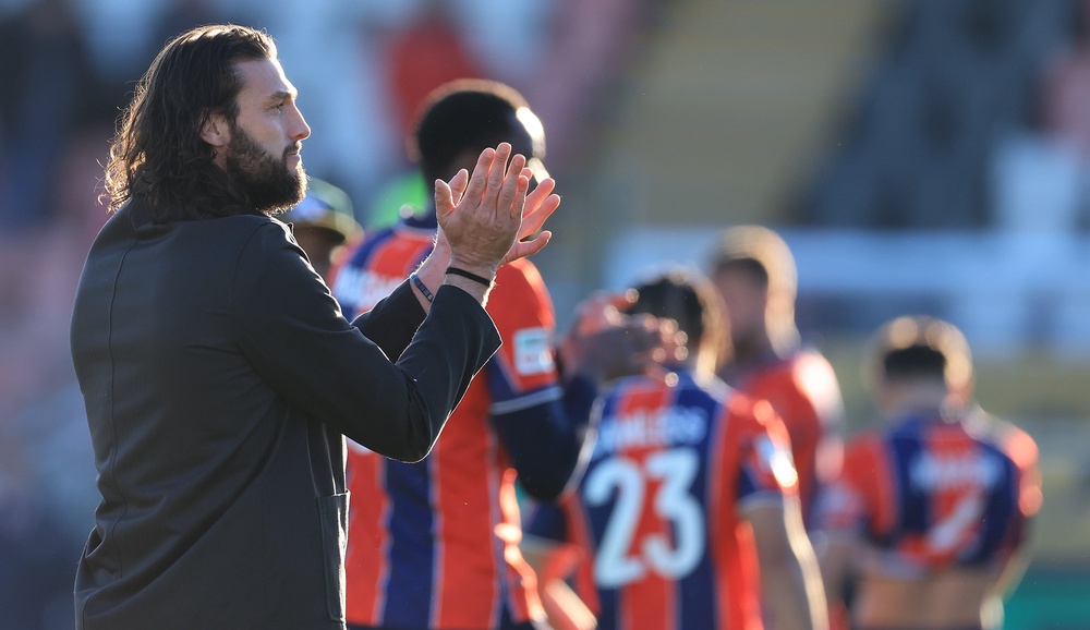 Carroll applauds fans after a National League South match between Dagenham & Redbridge and Torquay United (Getty)