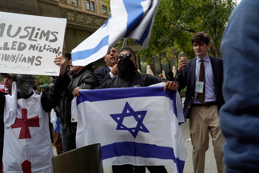 Demonstrators gather to protest following Israeli Prime Minister Benjamin Netanyahu’s address in New York (Madison Swart/AP) (AP)