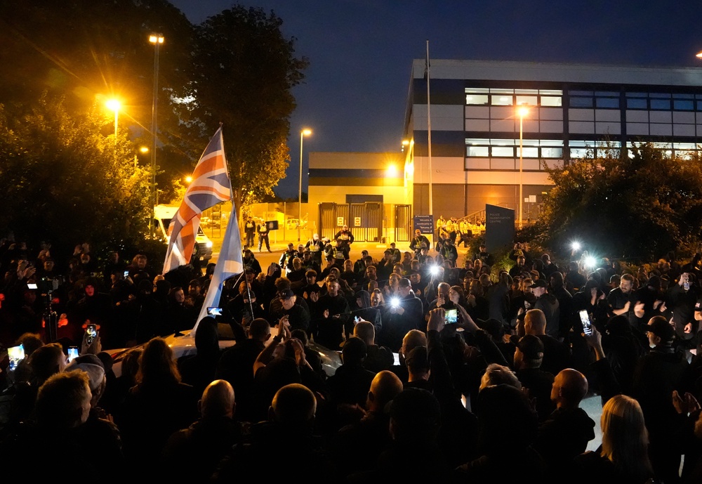 Protesters gathered outside the Hampshire Constabulary Police Investigation Centre in Basingstoke on Thursday (PA)