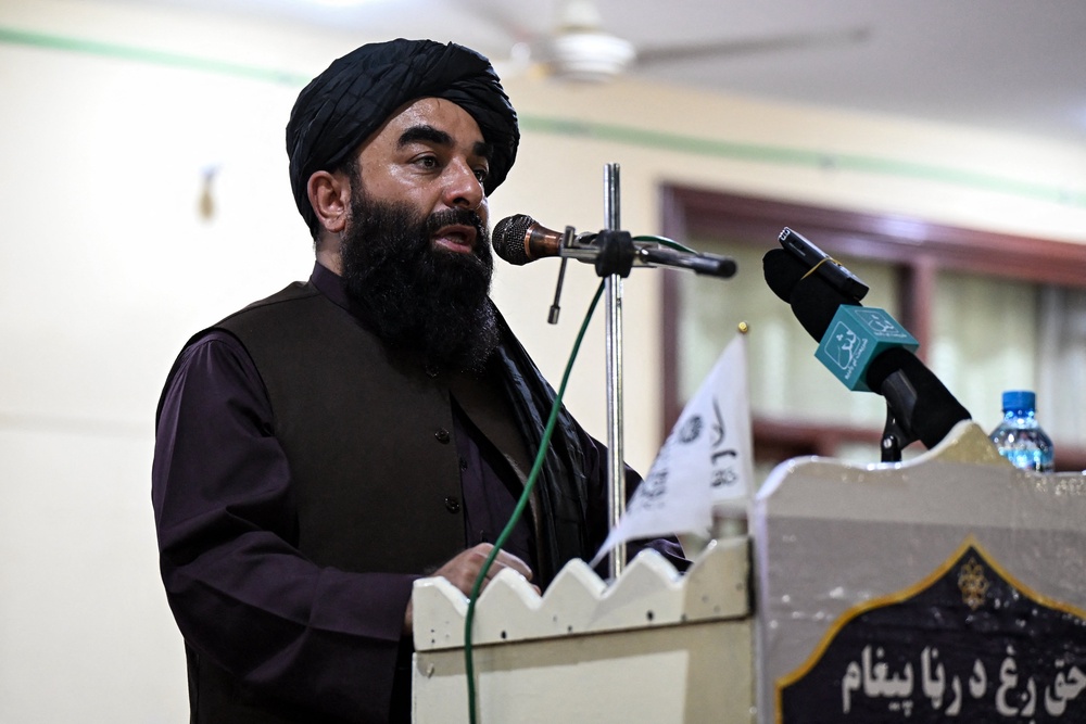 Taliban spokesman Zabihullah Mujahid speaks during a press conference at the Hamadiya Madrassa in Aino Mina town in Afghanistan's Kandahar province on 24 September 2026 (AFP/Getty)