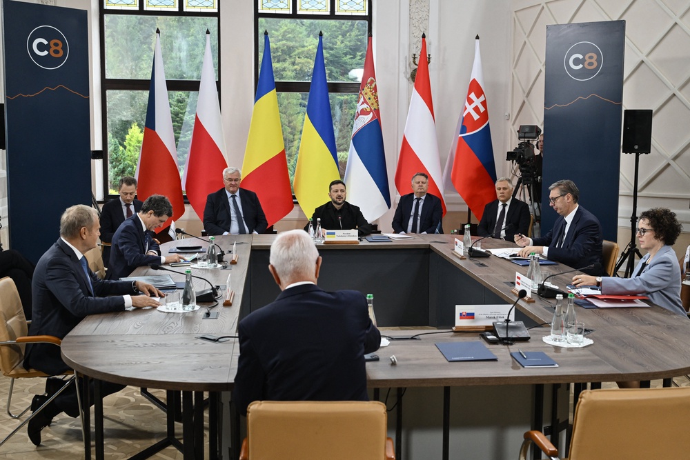 (From L on table) Poland's Prime Minister Donald Tusk, Romania's President Nicusor Dan, Ukraine's President Volodymyr Zelensky, Serbia's President Aleksandar Vucic and President of the Federal Council of Austria Christine Schwarz-Fuchs attend the Carpathian 8 summit on Sept 18 amid the Russian invasion of Ukraine (AFP/Getty)
