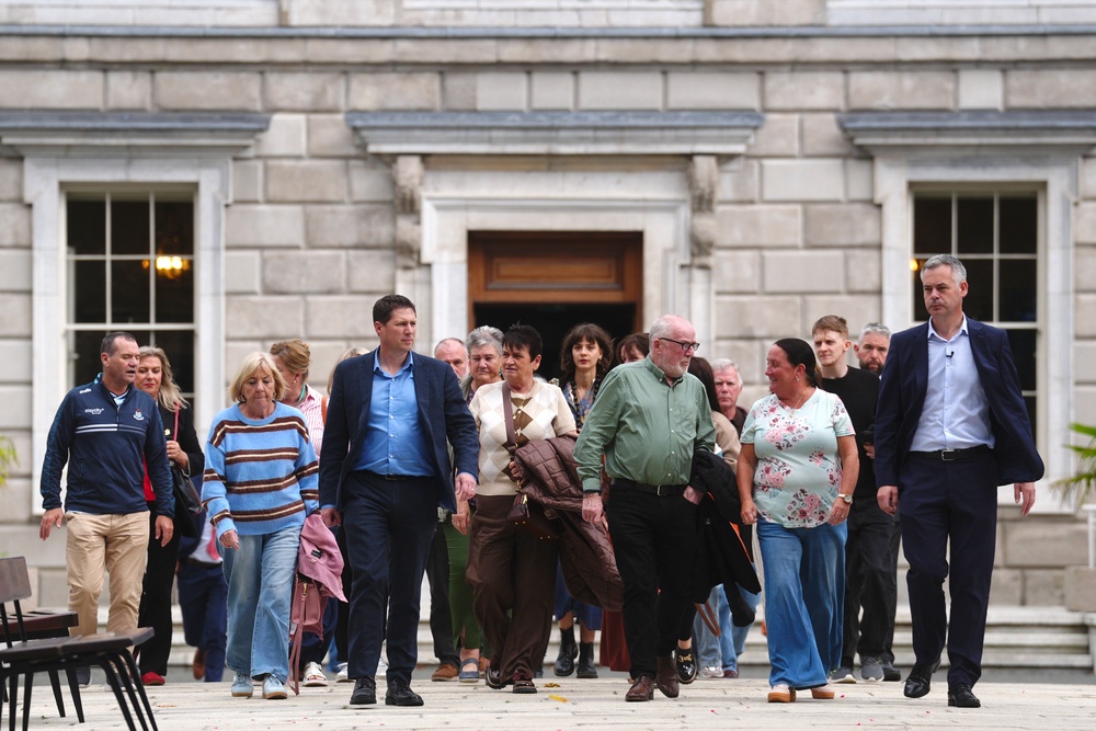 Sinn Féin TDs Pearse Doherty (far right) and Matt Carthy (fifth left) with members of the Garvaghy Road Residents Coalition at Leinster House, Dublin (Brian Lawless/PA) (PA Wire)