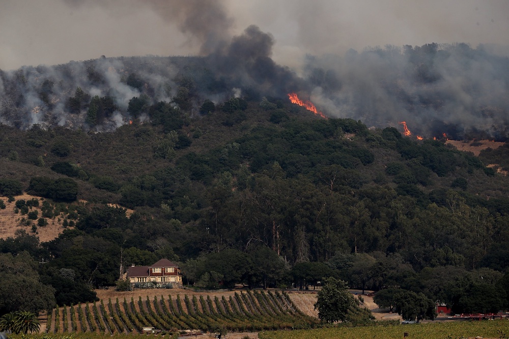 An out of control wildfire near Gundlach Bundschu winery on October 9, 2017 in Sonoma, California. (Getty)