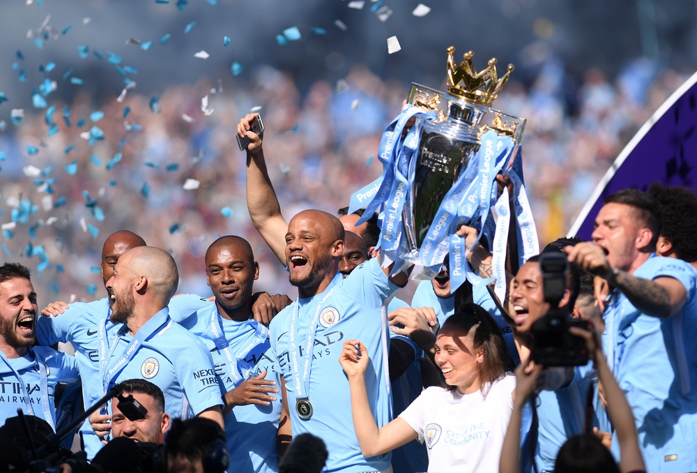 Manchester City won the Premier League title in 2017/18 in Pep Guardiola's second season in charge (Getty)
