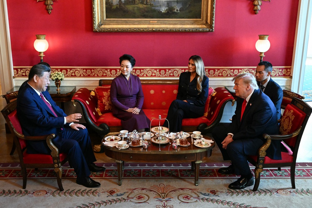 ‘We've made great strides, very positive for both countries,’ Trump said as he and Xi exchanged platitudes during their tea at the White House Red Room (AFP/Getty)