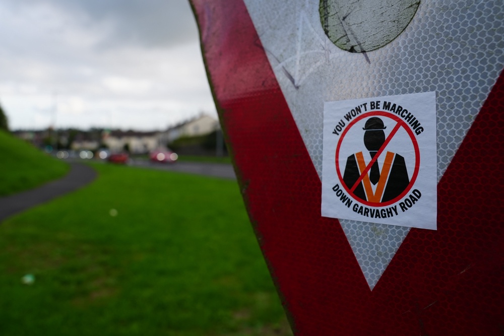 A sticker on a road sign on the Garvaghy Road in Portadown (Brian Lawless/PA) (PA Wire)
