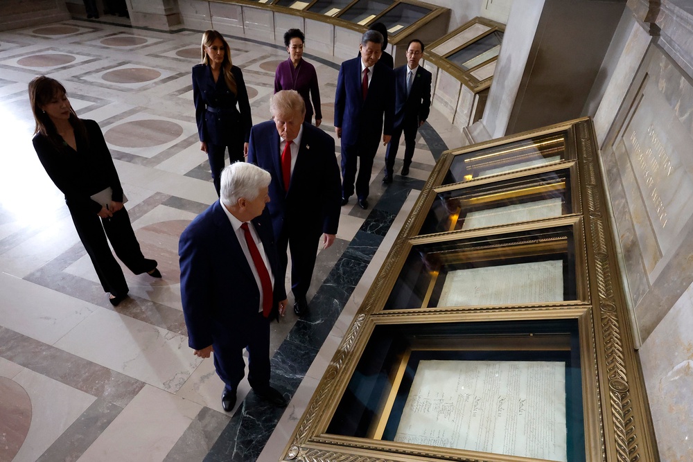 Archivist of the United States Bradford Wilson (L) leads U.S. President Donald Trump, President of China Xi Jinping, first lady of China Peng Liyuan and first lady Melania Trump on a tour of the National Archives (Getty)