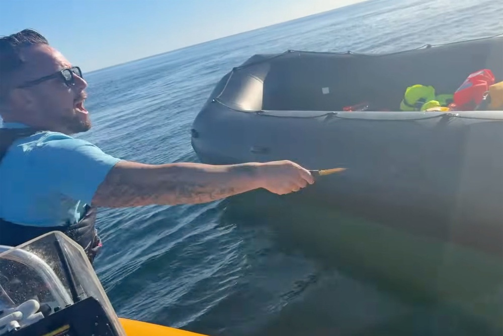 Mr Thomas was charged with criminal damage on Thursday after he was accused of slashing a boat (Social media)