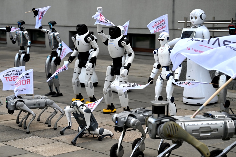 Humanoid and quadruped robots during a demonstration calling for the regulation of artificial intelligence development (AFP/Getty)