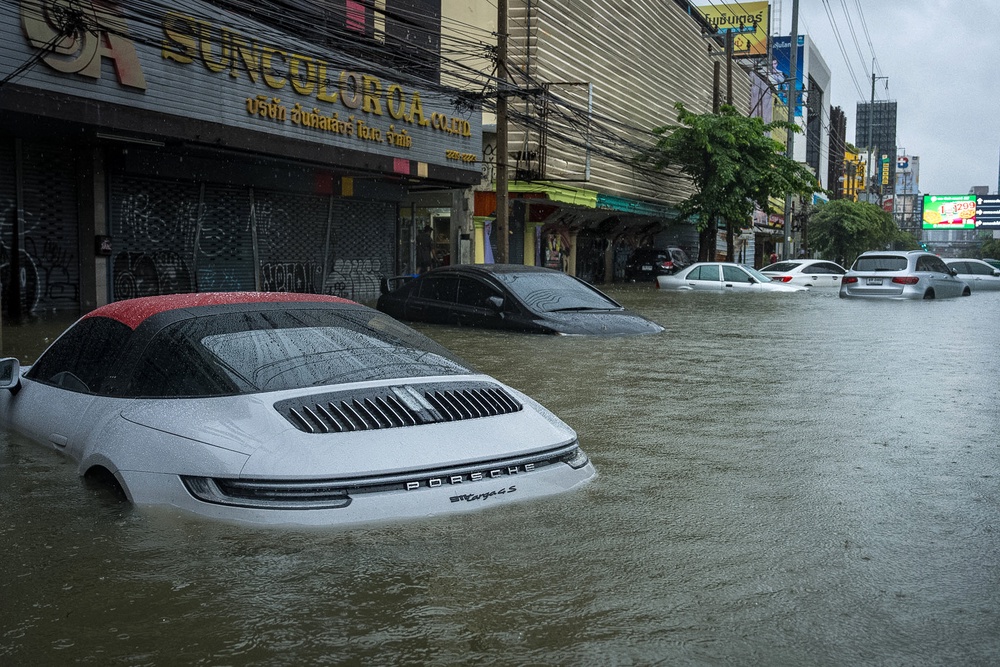 Cars are submerged in flood waters after heavy rain in Bangkok on September 26, 2026 (AFP/Getty)
