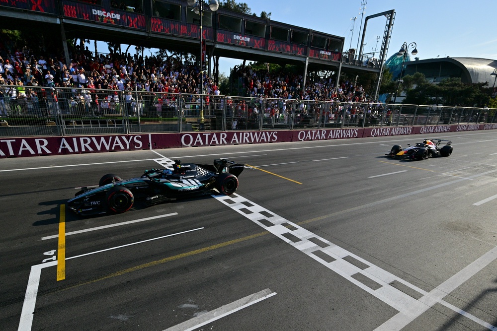 Russell pipped Verstappen at the line by 0.1 seconds (AP)