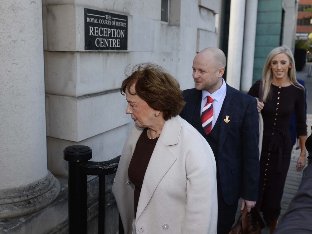 Diane Dodds (left), Jamie Bryson (centre) and Carla Lockhart (right) of the DUP arrive at Belfast High Court (Mark Marlow/PA) (PA Wire)