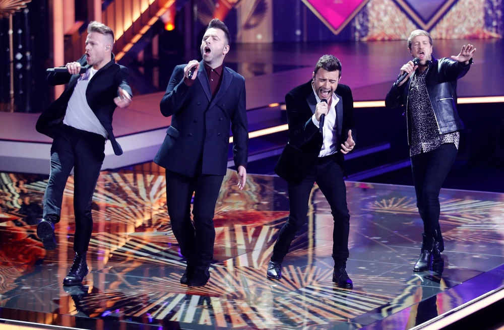 Westlife perform during the annual German film and television awards 'Golden Camera' ('Die Goldene Kamera') of German TV magazine 'HoerZu' in Berlin on March 30, 2019 (AFP/Getty)