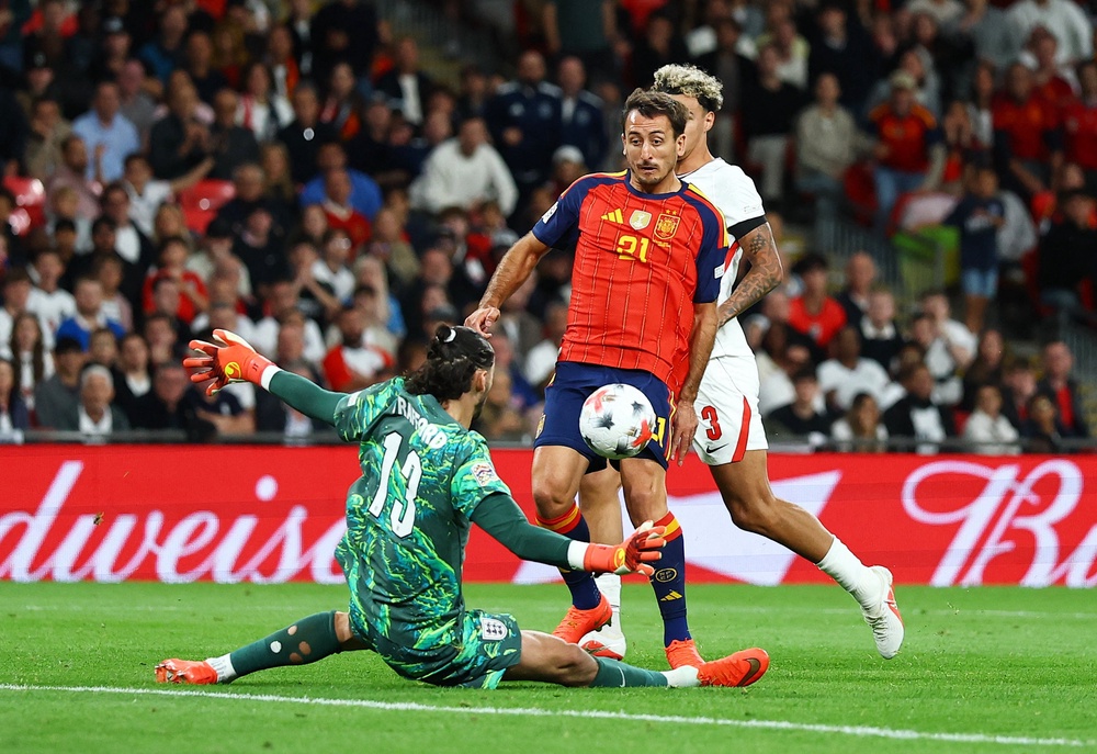 Mikel Oyarzabal dinked the winning goal over Trafford to secure the points for Spain (Reuters)