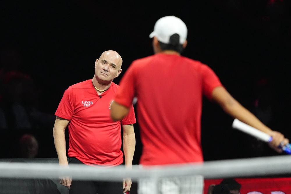 Team World captain Andre Agassi, left, reacts with Learner Tien (Adam Davy/PA) (PA Wire)