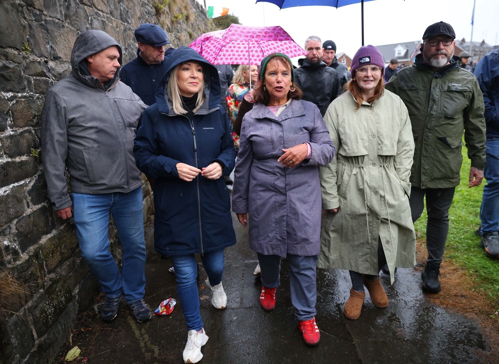 First Minister Michelle O’Neill (centre left) and Sinn Féin president Mary Lou McDonald (centre) at the Garvaghy Road ahead of a Portadown District Loyal Orange Lodge (LOL) No 1 march (Peter Morrison?PA) (PA Wire)