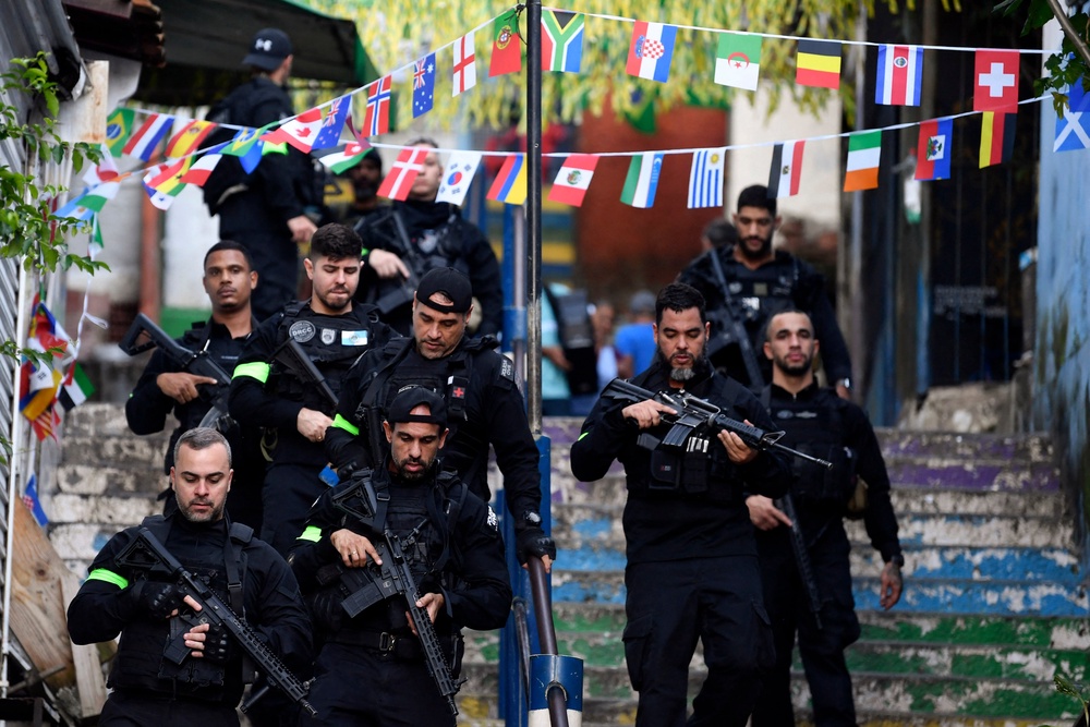 Brazilian Civil Police officers patrol a street during the Operation Containment at the Santa Marta favela, in Rio de Janeiro, Brazil, on June 23, 2026 (AFP via Getty Images)