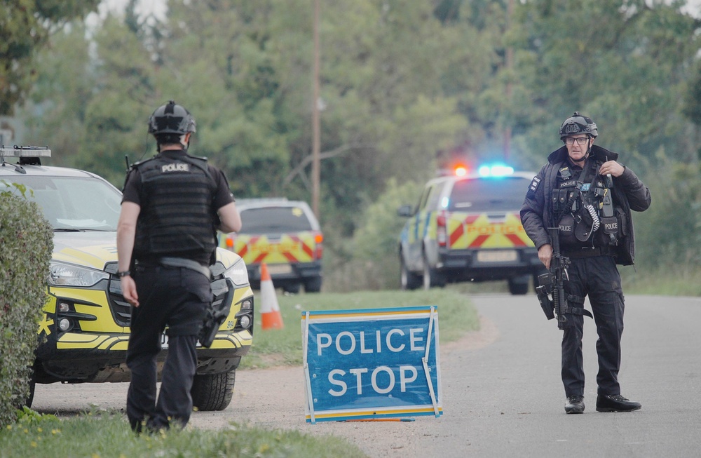 Police at a road block on the road to RAF Fairford (Ben Birchall/PA) (PA Wire)