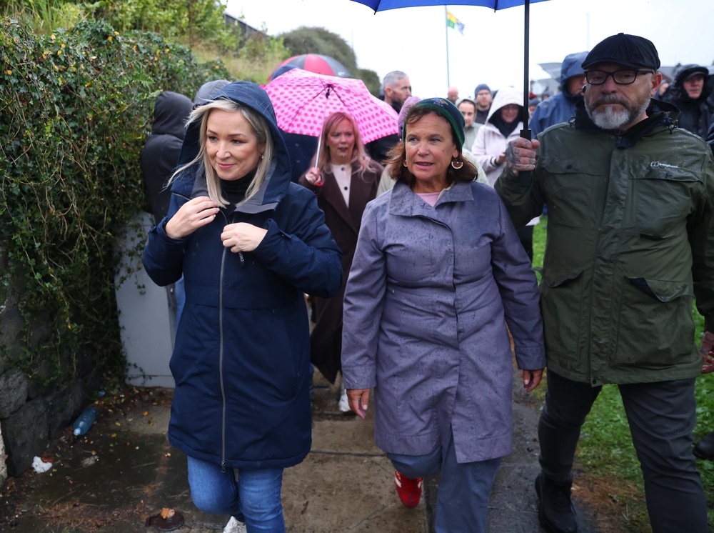 First Minister Michelle O’Neill MLA (left) and Sinn Féin president Mary Lou McDonald (centre) at the Garvaghy Road (Peter Morrison/PA). (PA Wire)