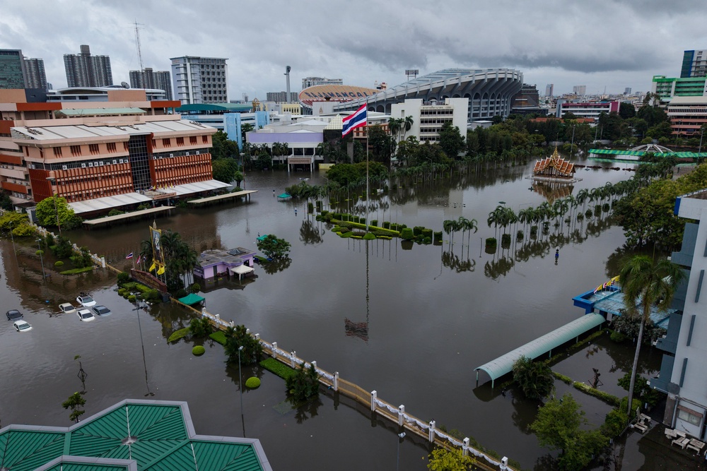 An aerial view shows Thailand's national flag fluttering near the flooded grounds of Ramkhamhaeng University and Rajamangala National Stadium (back) in Bangkok (AFP/Getty)