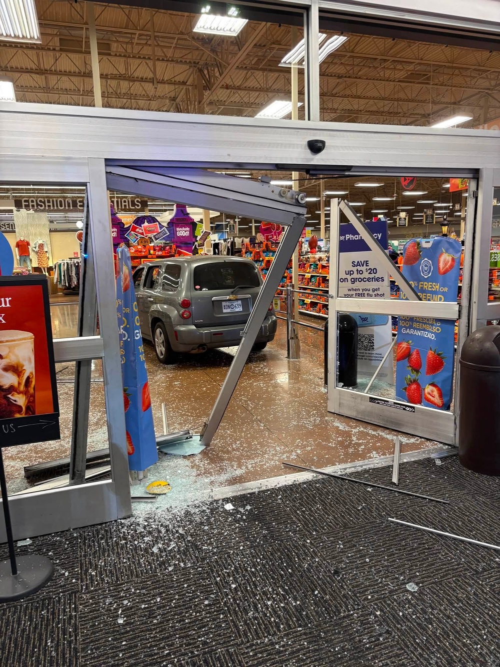 Photos shared by police show extensive damage to the storefront following the incident (Rosenberg Police Department)