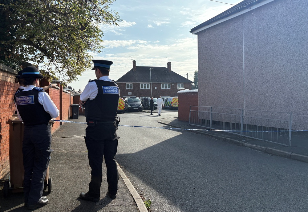 Emergency personnel at the scene of the fire in Stone Square, Bootle (Eleanor Barlow/PA) (PA Wire)