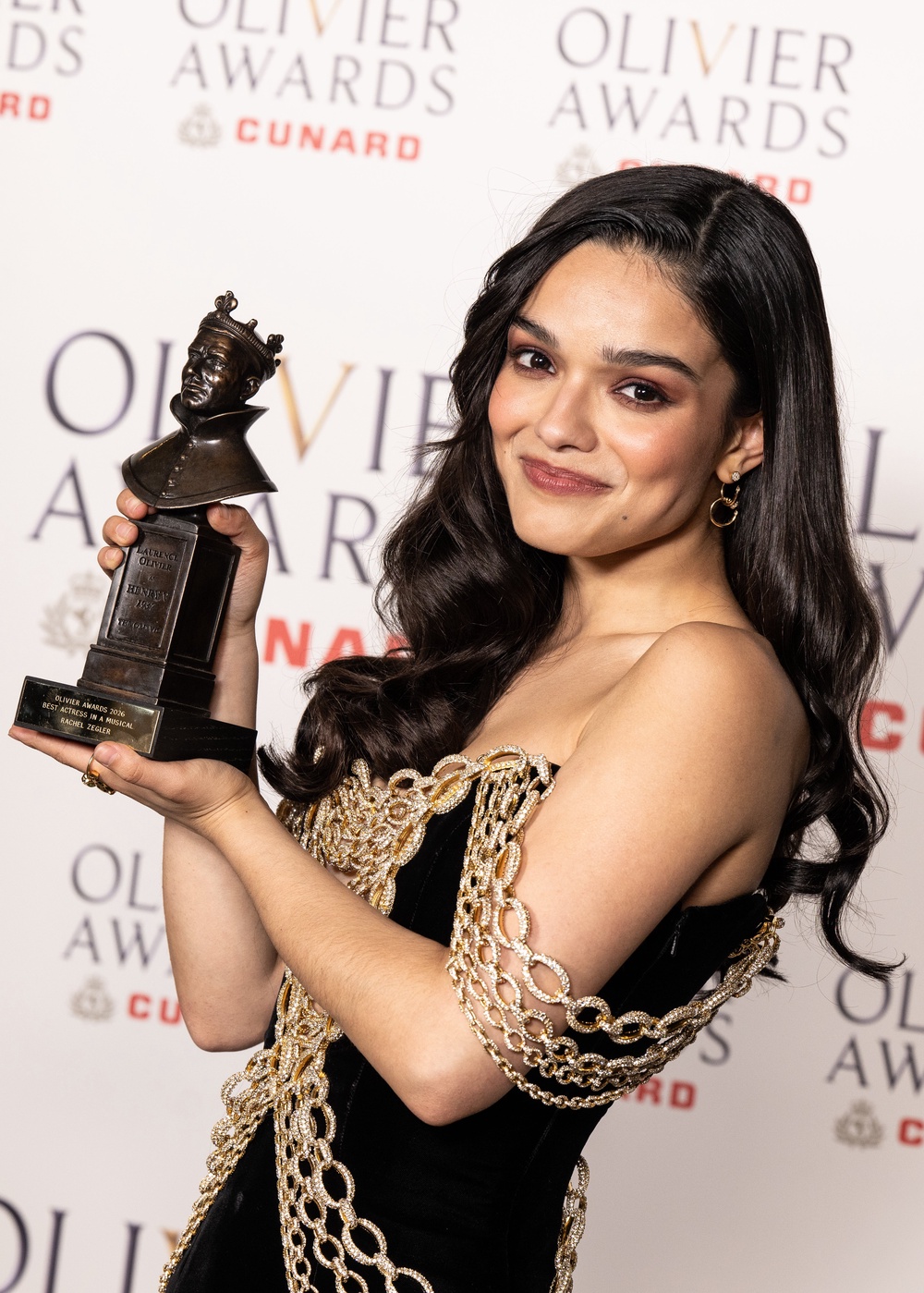 Rachel Zegler poses with the Best Actress In A Musical Award for 