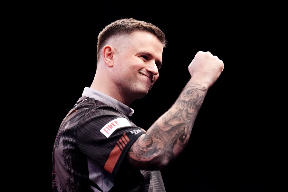 Luke Woodhouse produceed the biggest win of his career by defeating Luke Littler (John Walton/PA) (PA Archive)
