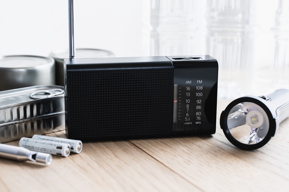 Keep some batteries, a radio, a torch and tinned food in your emergency kit at home. (Getty Images)