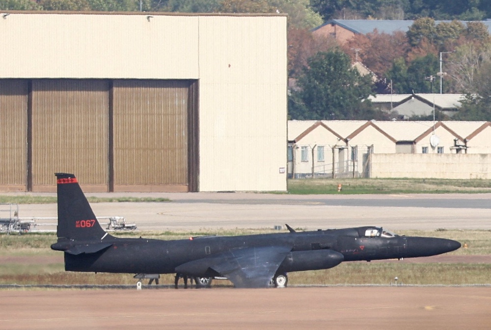 A U-2 reconnaissance aircraft lands at RAF Fairford  on Tuesday, after the suspected terror plot (Reuters)