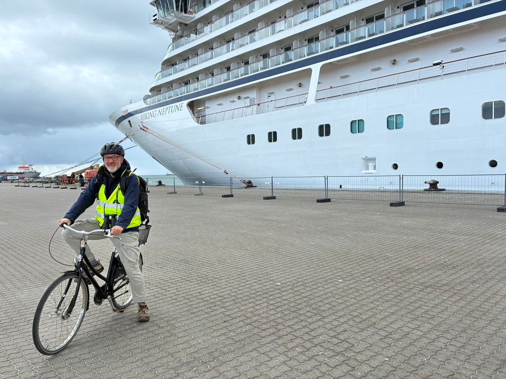 Writer Mike Unwin beside Viking Neptune cruise ship (Mike Unwin)